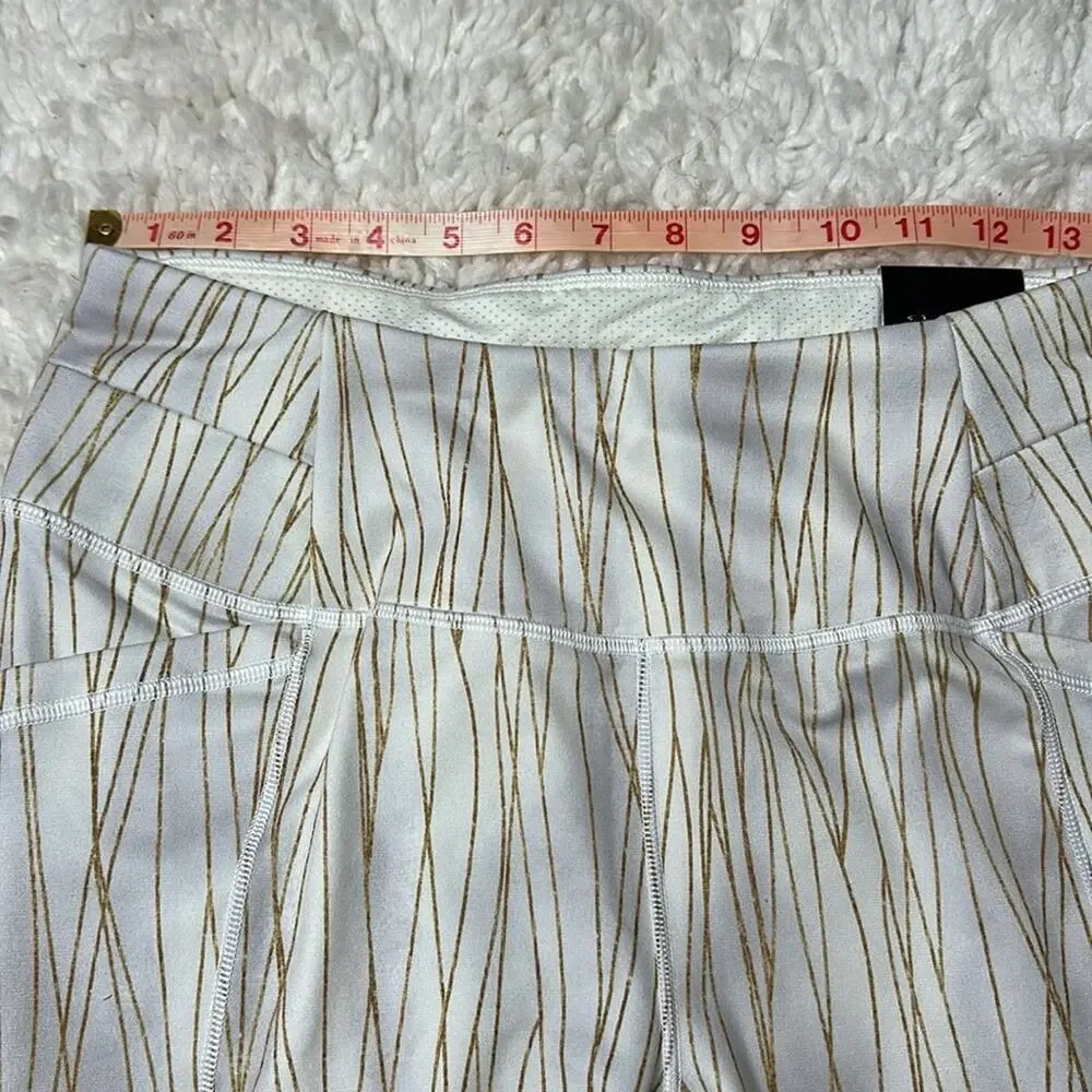 CALIA by Carrie Underwood White and Gold Leggings Warm Collection Pockets Ankle
